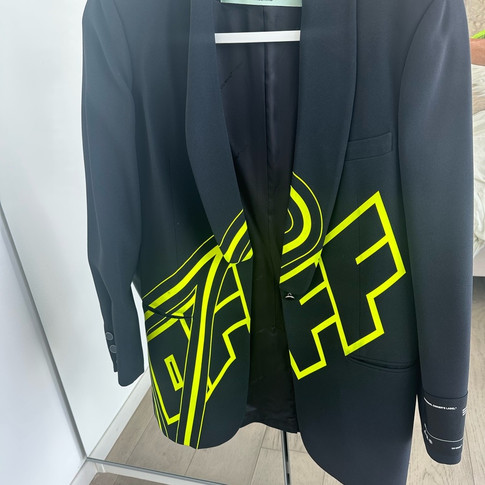 Almost brand New off white blazer .
